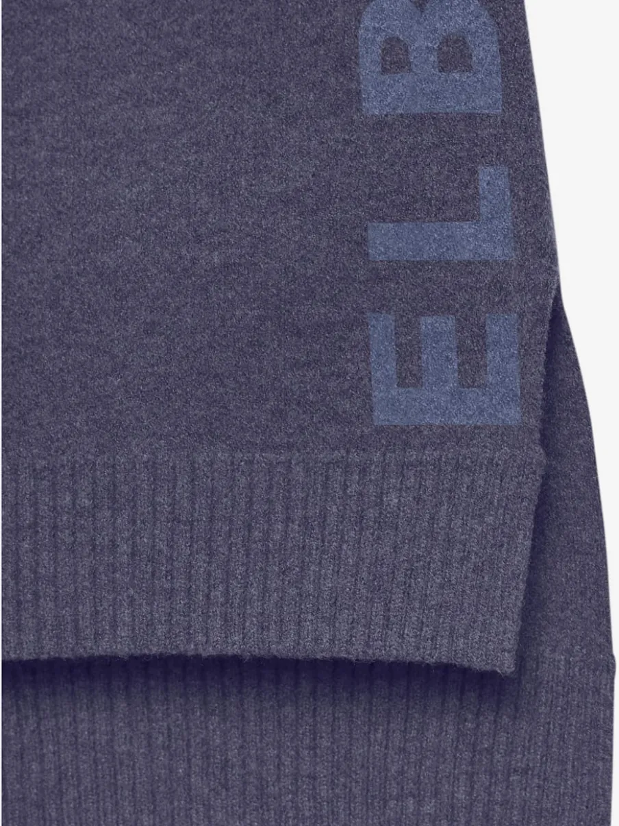 Sweater ample avec encolure en V et manches longues.
