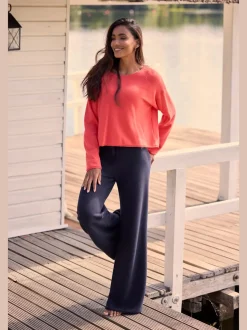 Sweater à encolure ronde avec manches longues et bord roulé