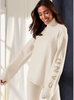 Sweater en tricot doux avec col roulé et manches longues