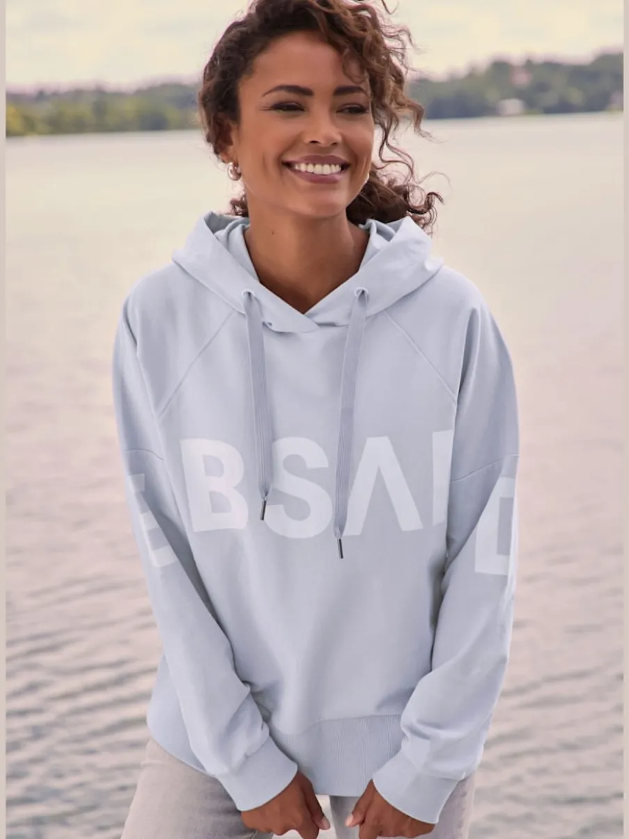 Sweatshirt à capuche avec grande capuche et motifs graphiques