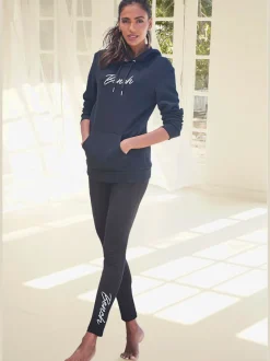 Sweatshirt à capuche avec poche kangourou et bords-côtes