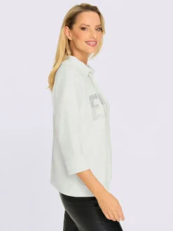 Sweatshirt col montant avec inscription et petites pierres