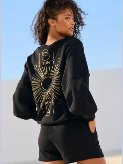 Sweatshirt à encolure ronde avec bords-côtes et coton doux