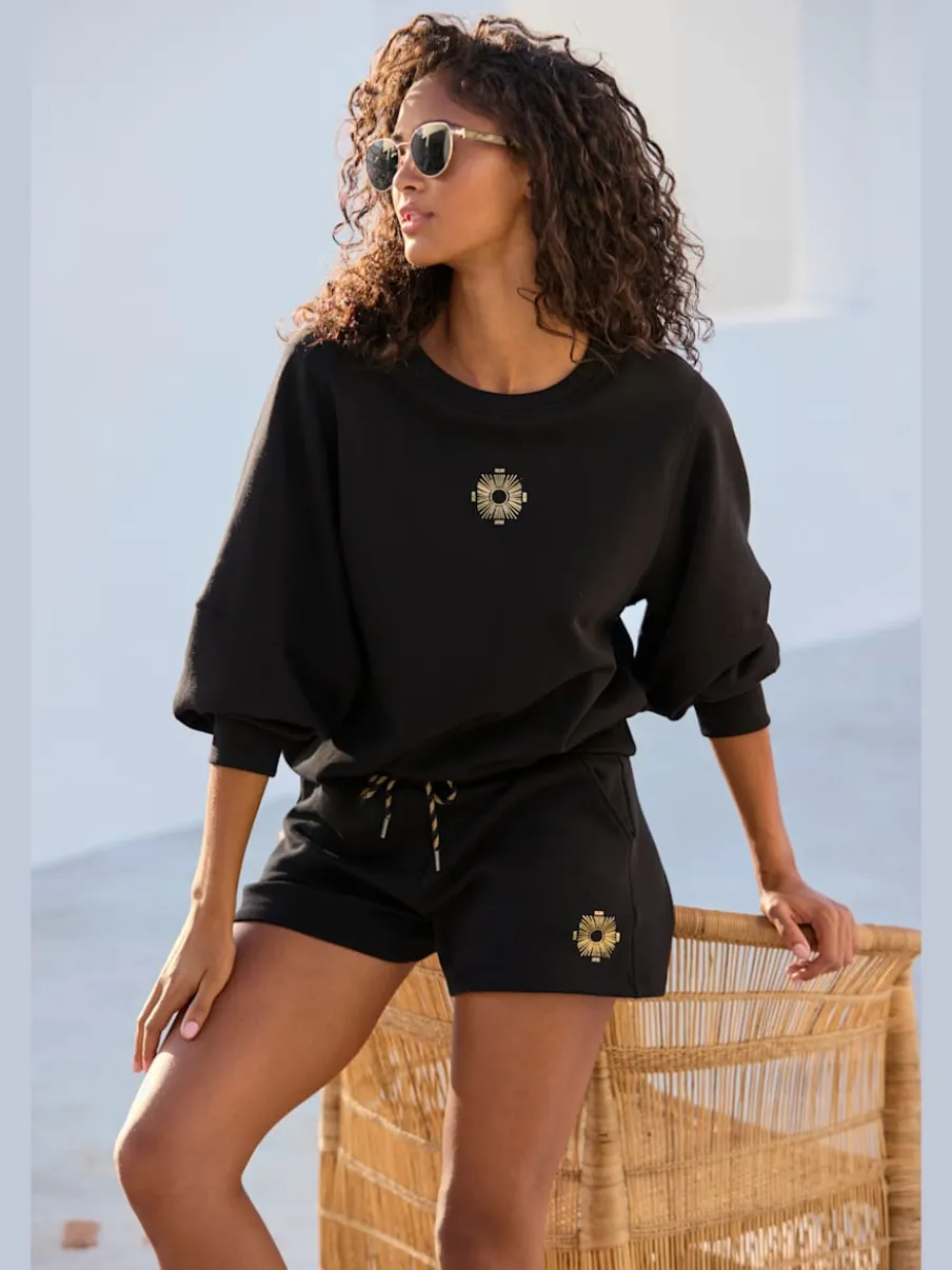 Sweatshirt à encolure ronde avec bords-côtes et coton doux