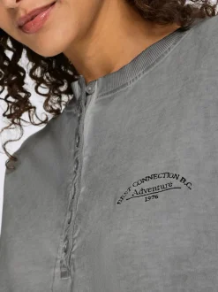 Sweatshirt en pur coton à encolure ronde avec patte de boutonnage et manches longues