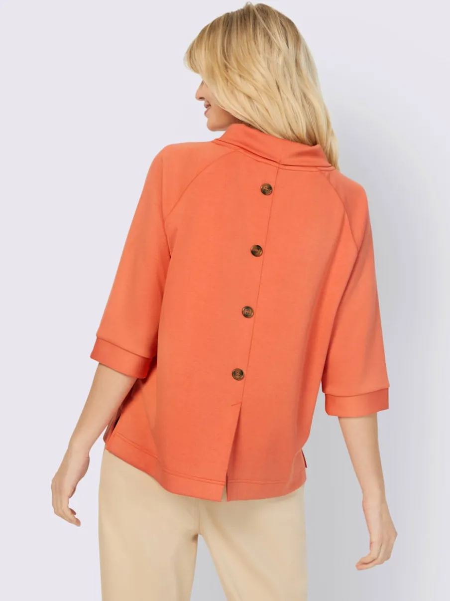 Sweatshirts en modal doux avec col montant et manches.