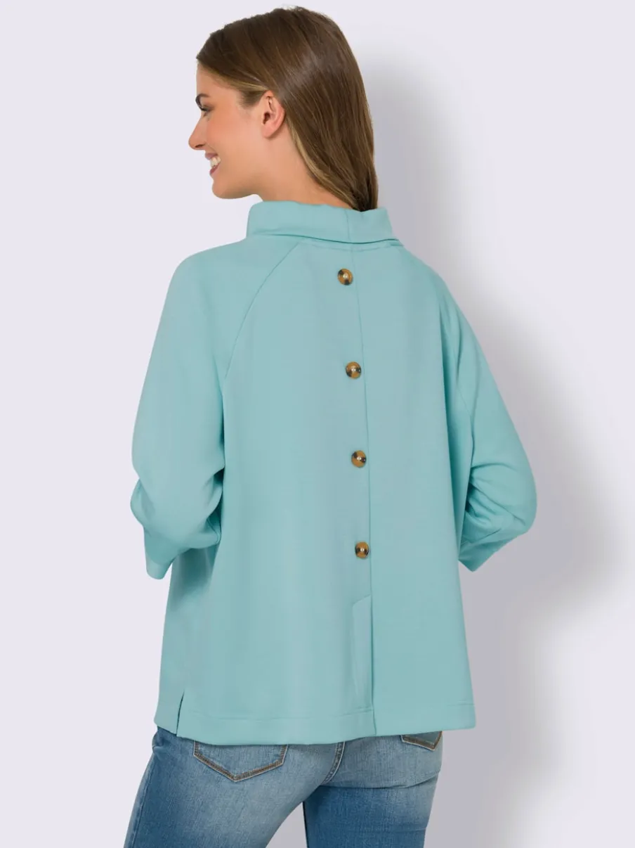 Sweatshirts en modal doux avec col montant et manches.