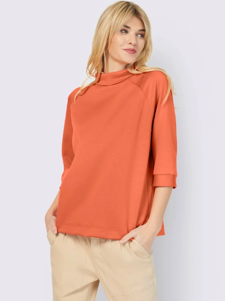 Sweatshirts en modal doux avec col montant et manches.