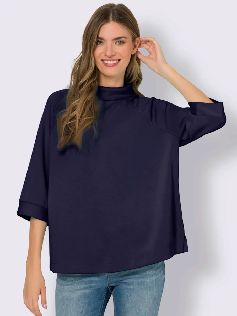 Sweatshirts en modal doux avec col montant et manches.