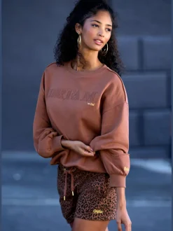 Sweatshirts à manches longues avec broderie et détails imprimés