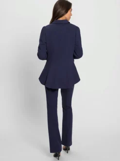 Tailleurs pantalons avec col à revers et manches bouffantes
