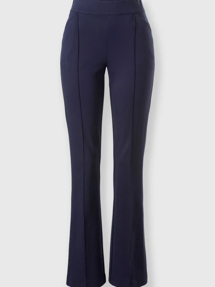 Tailleurs pantalons avec col à revers et manches bouffantes