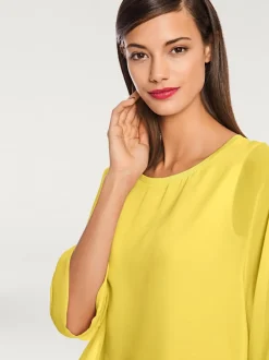 T-shirt ample avec col rond et manches 3/4 chauve-souris