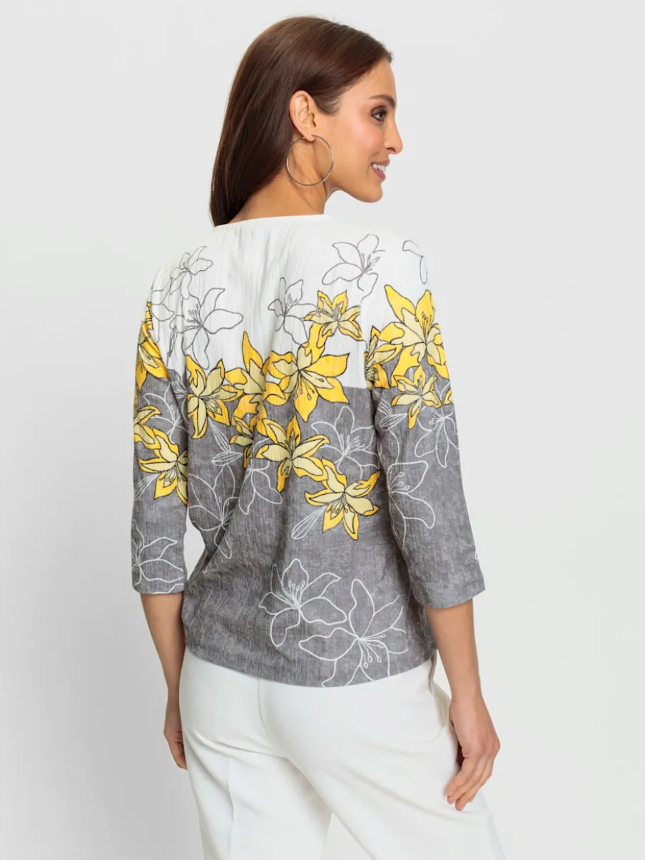 T-shirt avec imprimé floral encolure V et manches trois quarts