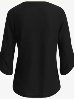T-shirt à col rond avec manches 3/4 et boutons à l'ourlet