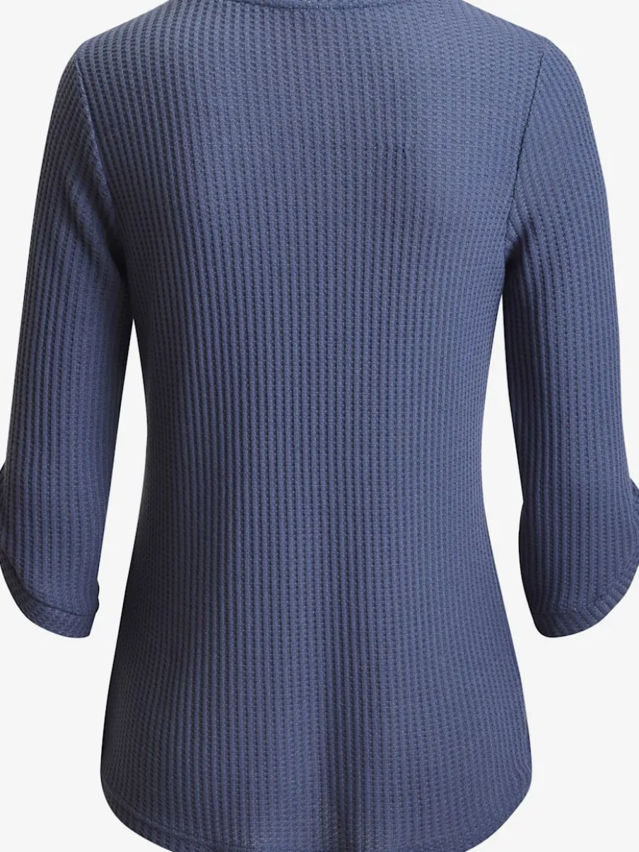 T-shirt à col rond avec manches 3/4 et boutons à l'ourlet