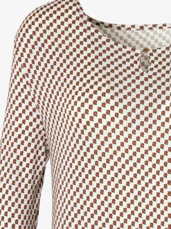 T-shirt à col rond avec petites ouvertures et bouton devant