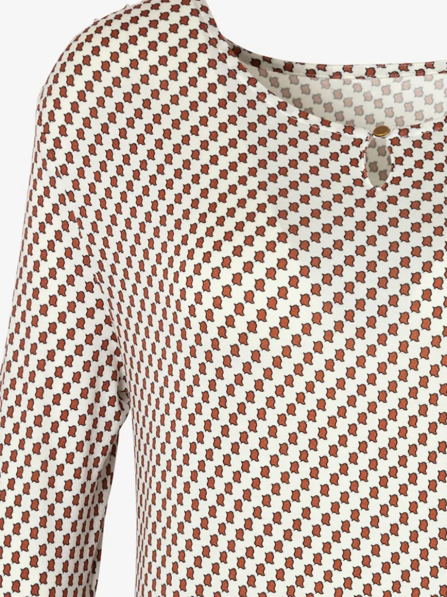 T-shirt à col rond avec petites ouvertures et bouton devant
