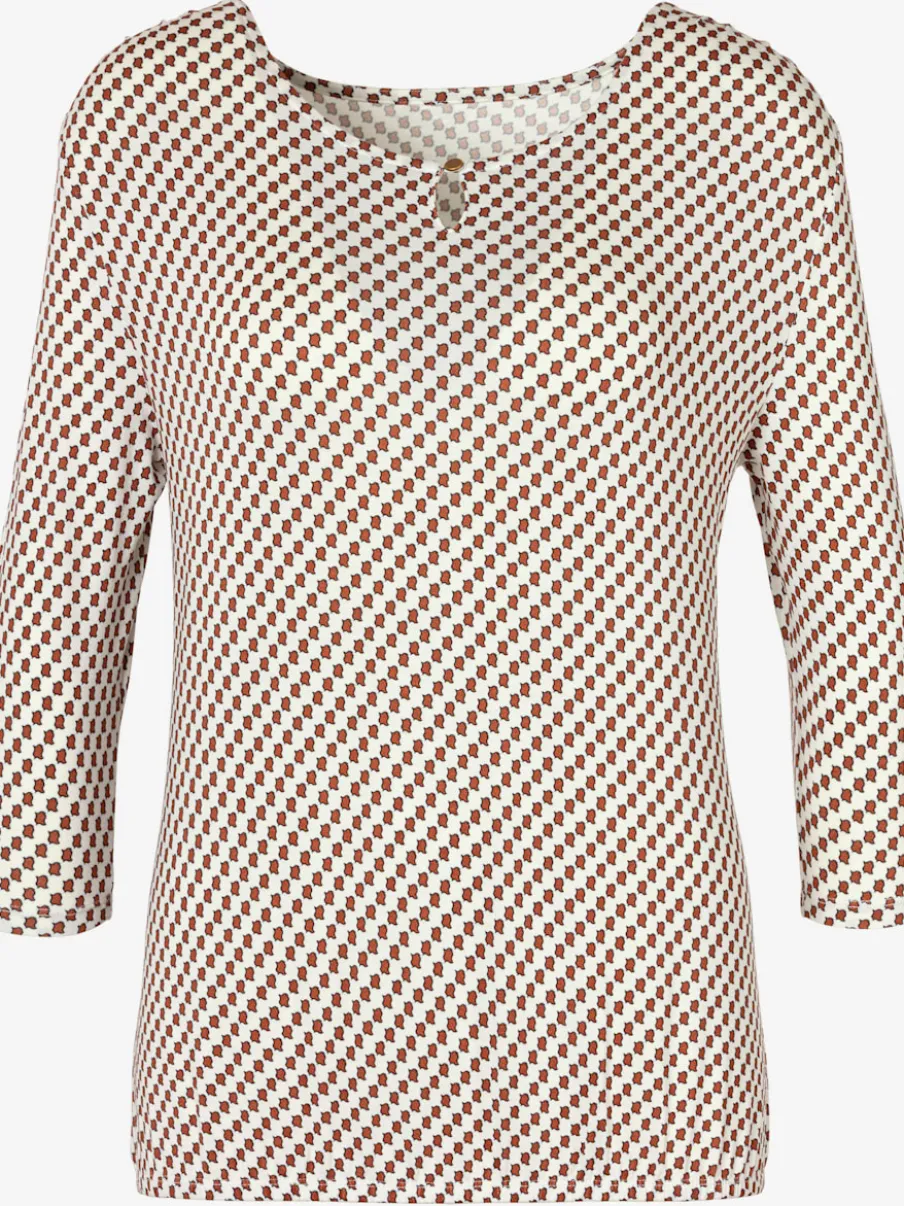 T-shirt à col rond avec petites ouvertures et bouton devant