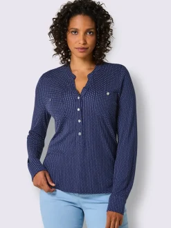 T-shirt à col V avec manches longues et motif à pois