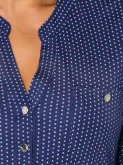 T-shirt à col V avec manches longues et motif à pois