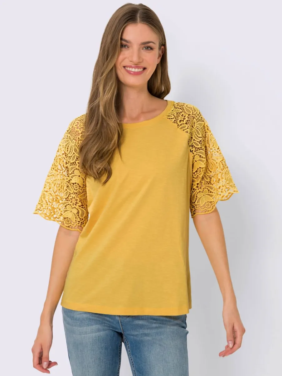T-shirt à encolure ronde avec manches en dentelle transparente