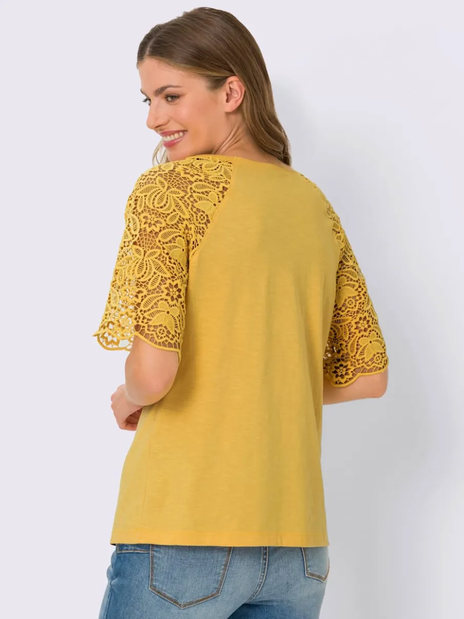 T-shirt à encolure ronde avec manches en dentelle transparente