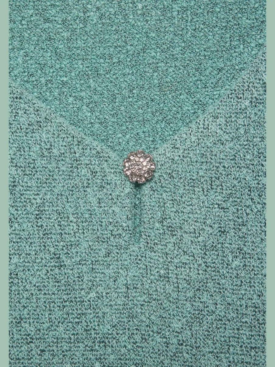 T-shirt à encolure V avec bouton brillant et strass
