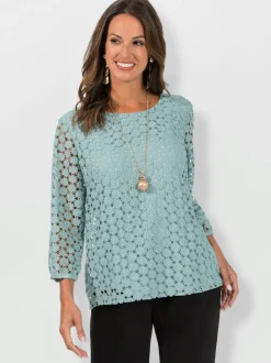 T-shirt en dentelle avec manches transparentes et fente