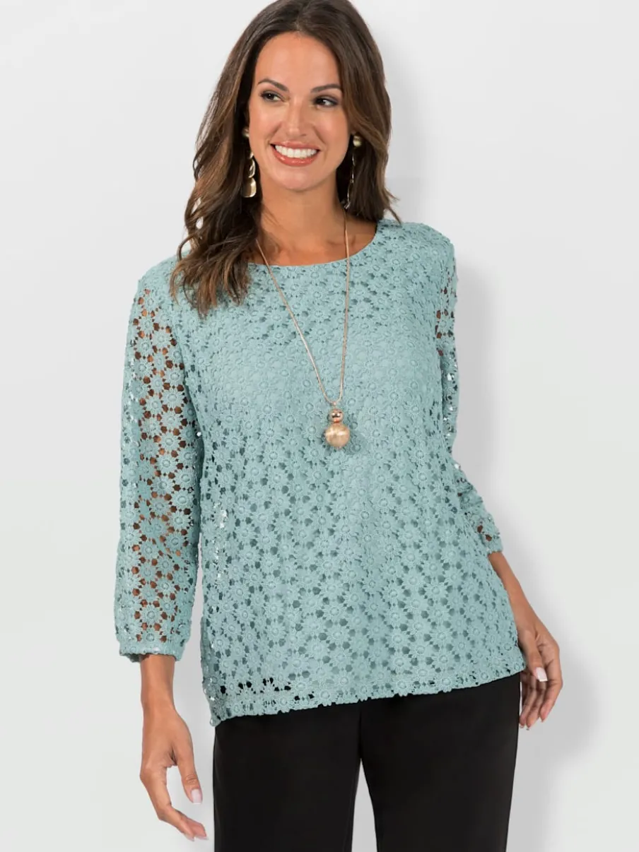 T-shirt en dentelle avec manches transparentes et fente