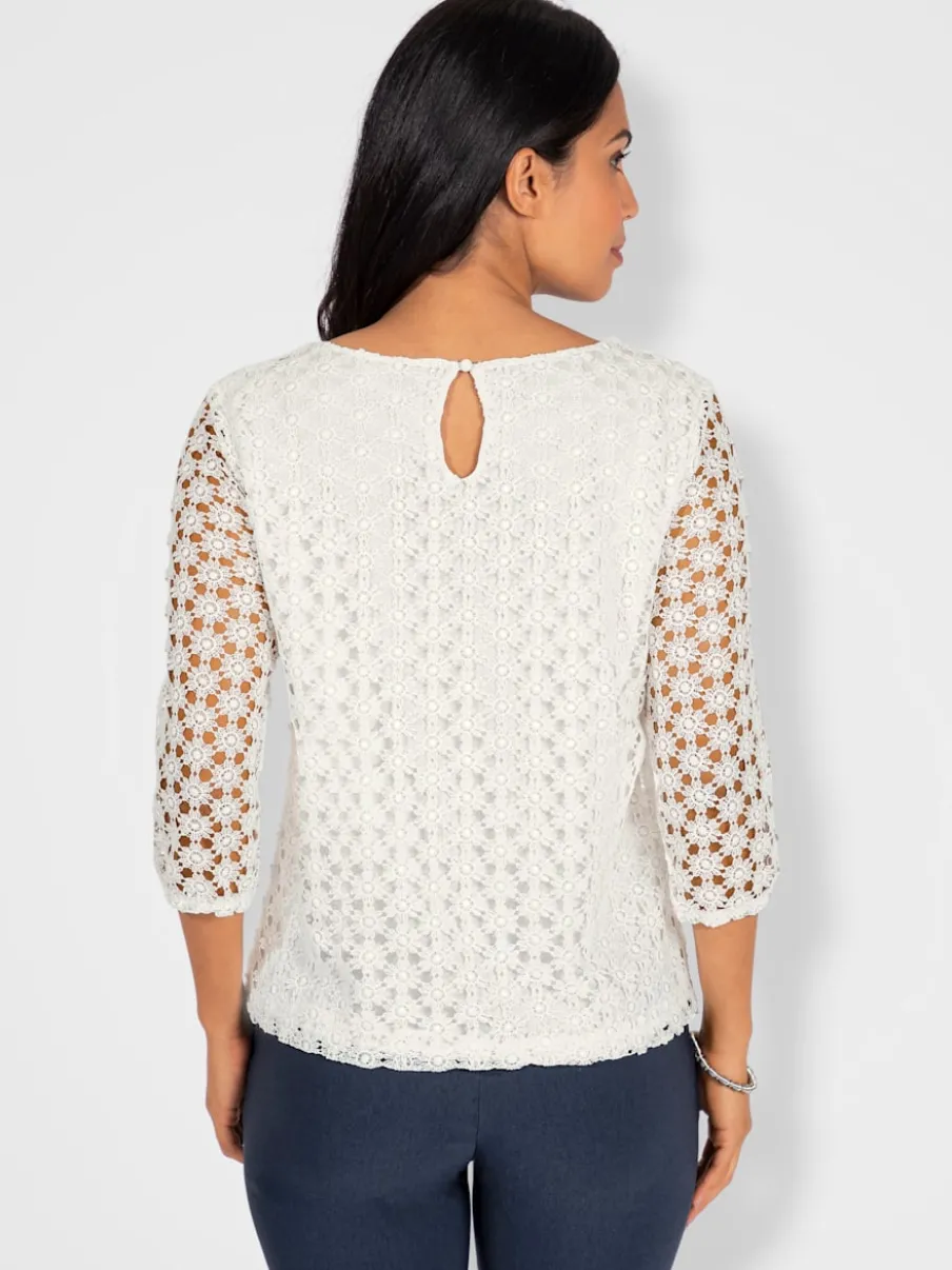 T-shirt en dentelle avec manches transparentes et fente