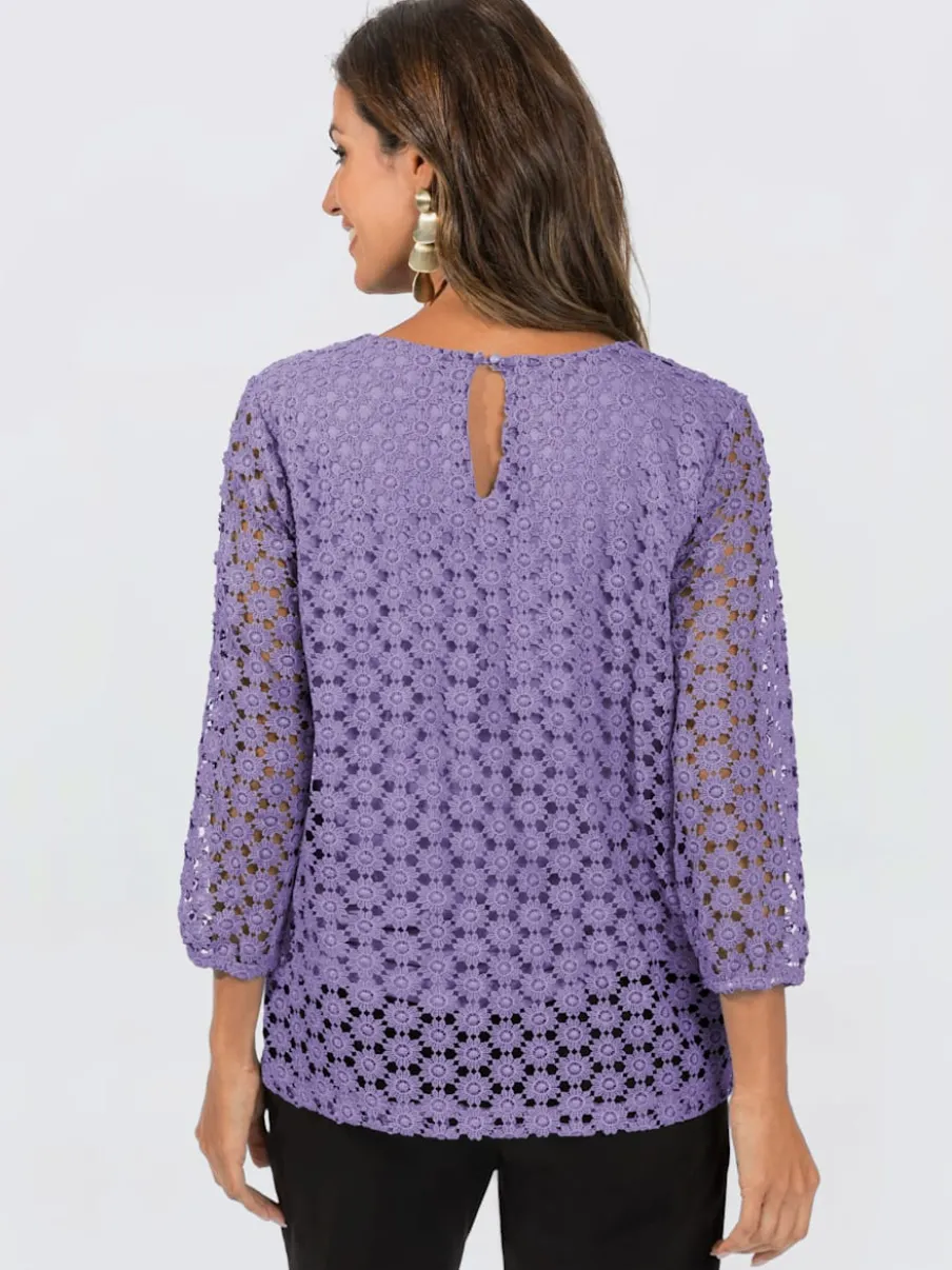 T-shirt en dentelle avec manches transparentes et fente