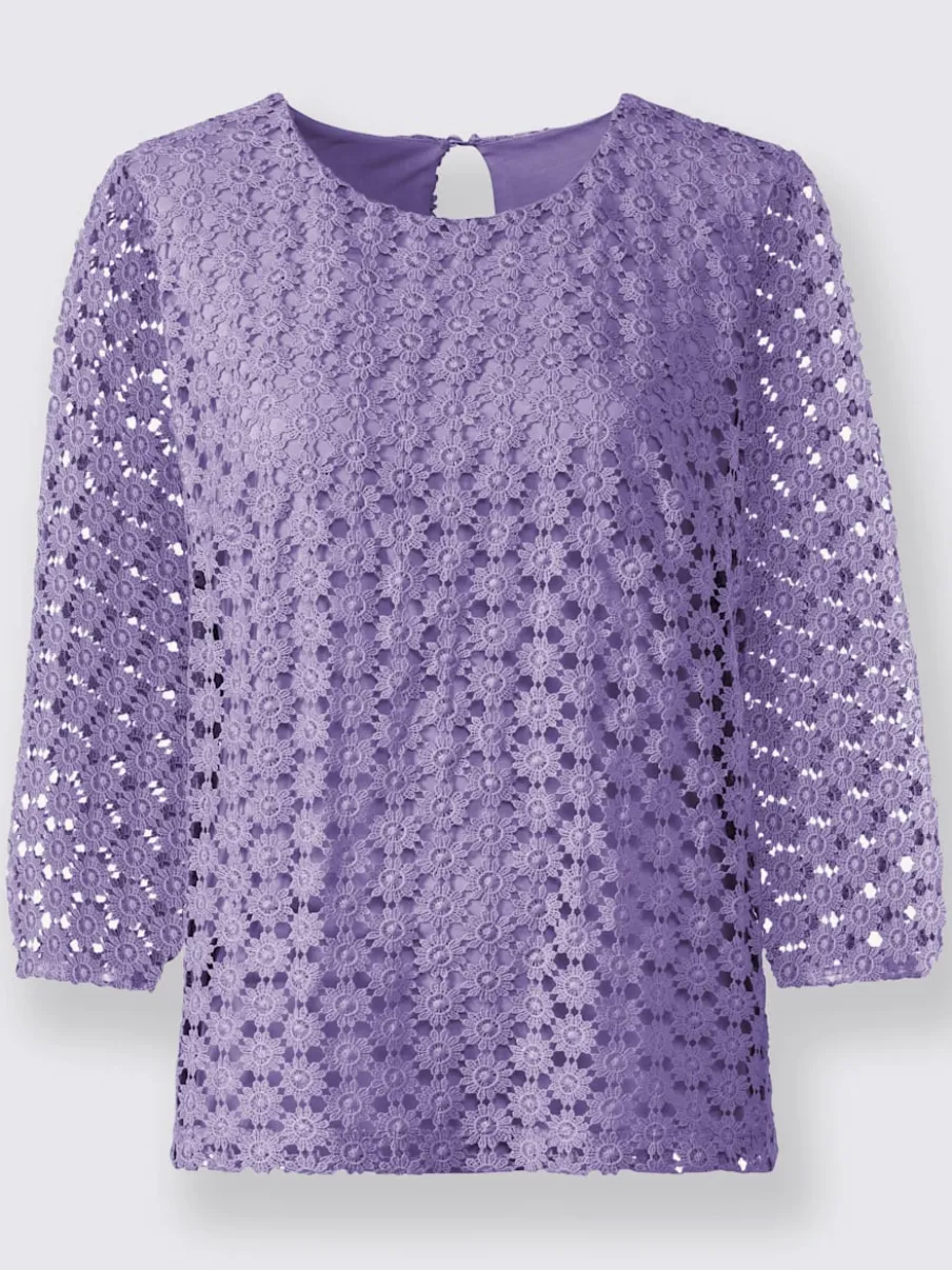 T-shirt en dentelle avec manches transparentes et fente