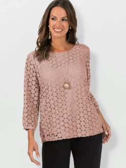 T-shirt en dentelle avec manches transparentes et fente