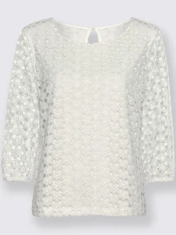 T-shirt en dentelle avec manches transparentes et fente