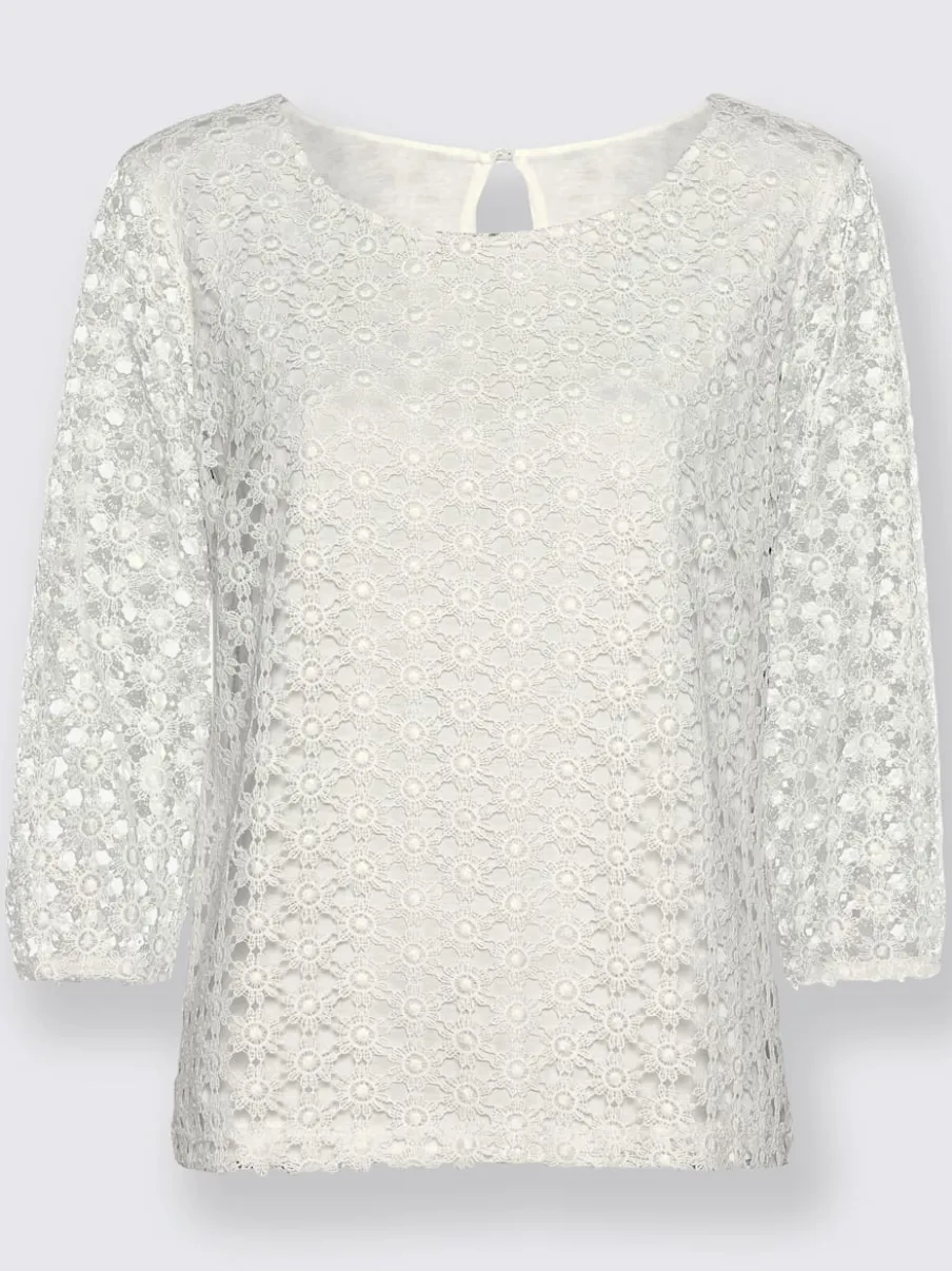 T-shirt en dentelle avec manches transparentes et fente