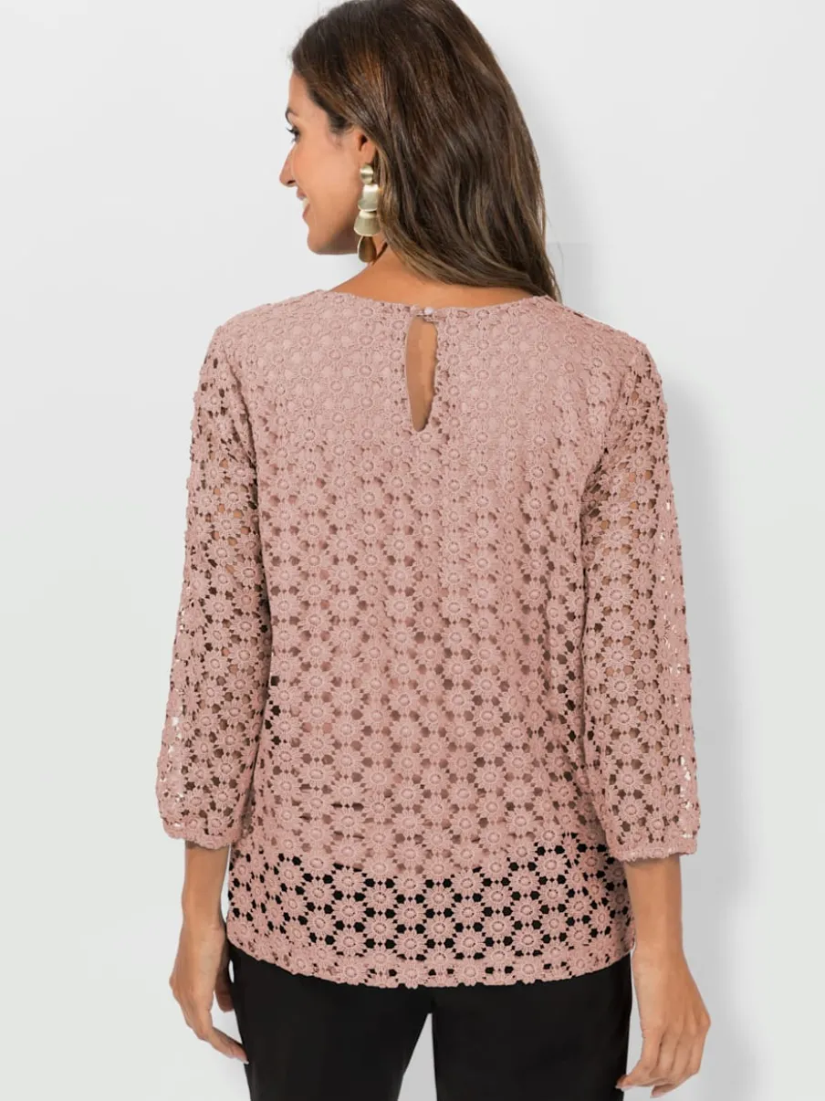 T-shirt en dentelle avec manches transparentes et fente
