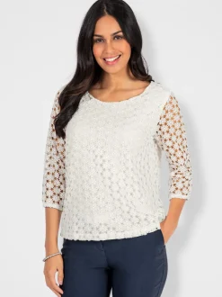 T-shirt en dentelle avec manches transparentes et fente