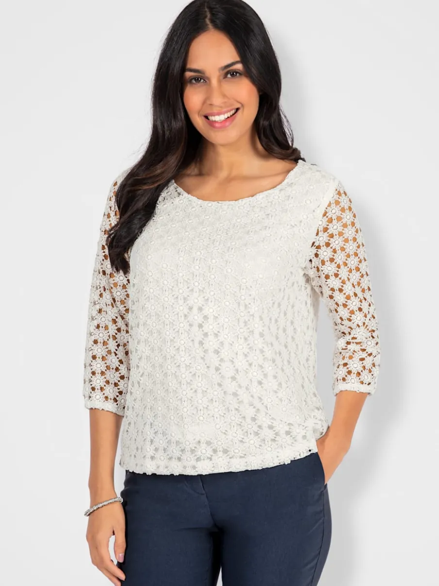 T-shirt en dentelle avec manches transparentes et fente