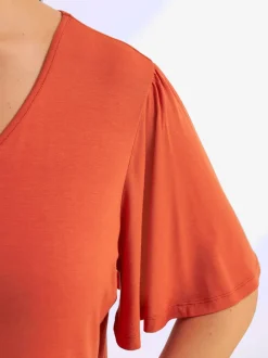 T-shirt en v manches chauve-souris affinantes
