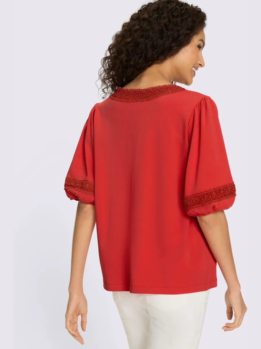 T-shirt féminin à large manches avec col V dentelé