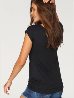 T-shirt large à col rond avec ceinture à l'ourlet
