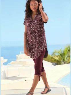 T-shirt long à encolure tunique avec bordure et motifs