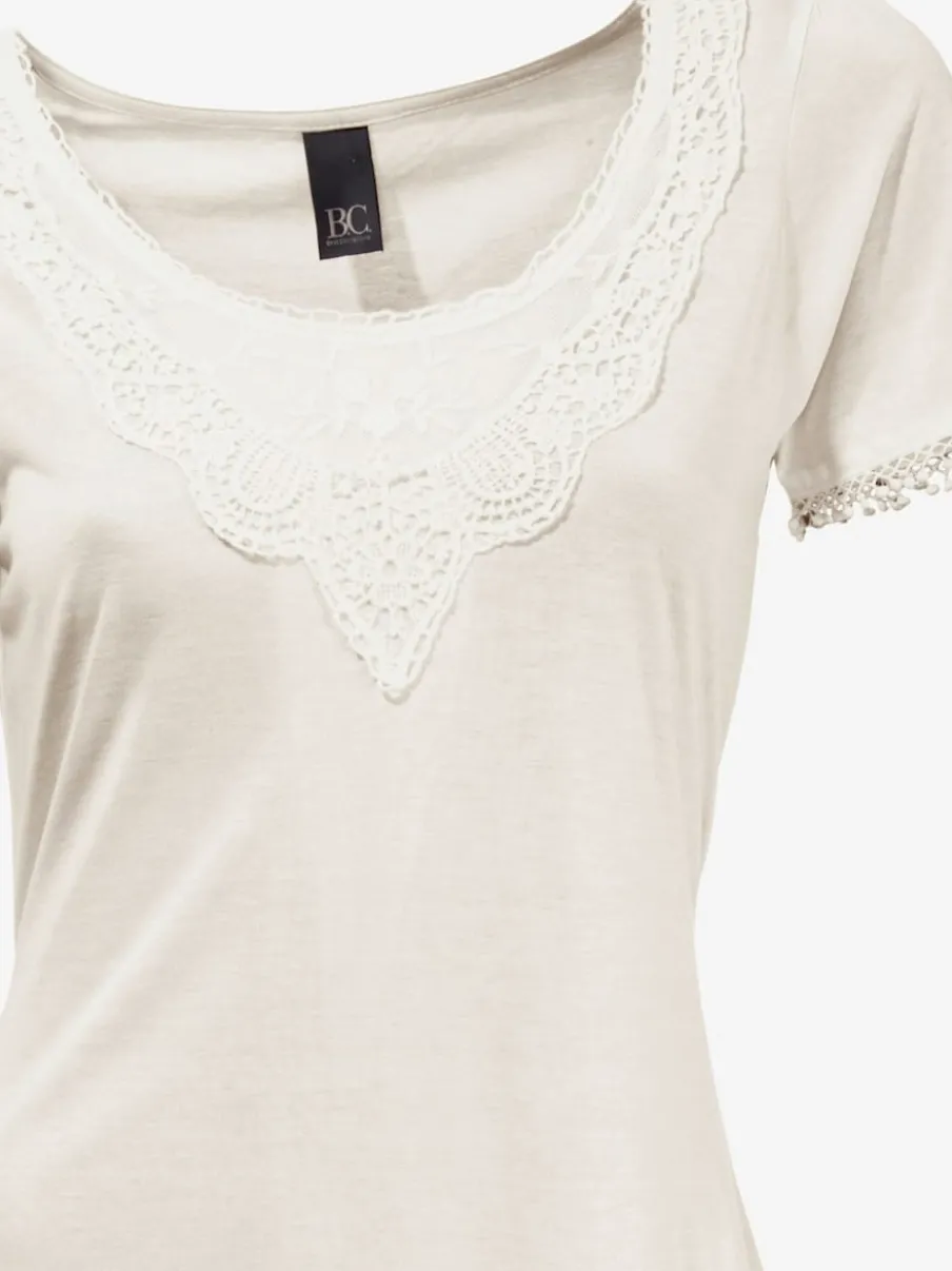 T-shirt long à l'encolure ronde et détails en dentelle