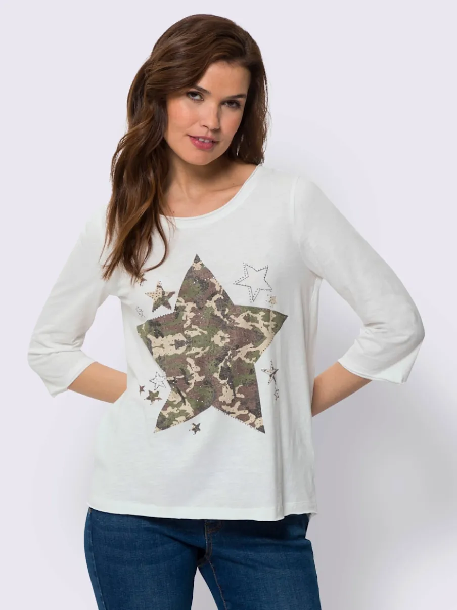 T-shirt à manches 3/4 avec motif étoilé et pierres.