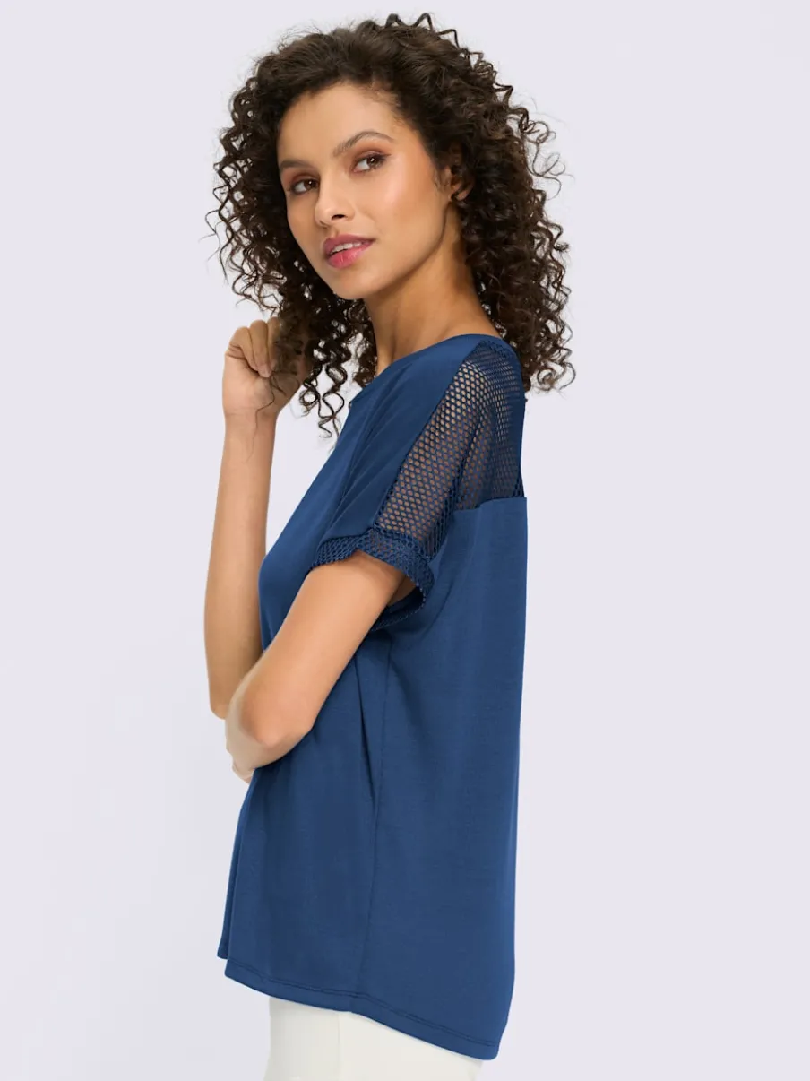 T-shirt à manches courtes avec empiècements en résille et motif floral