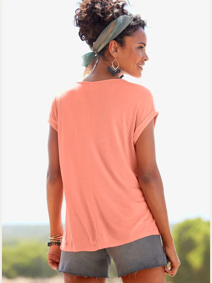T-shirt à manches courtes avec encolure ronde et boutons décoratifs