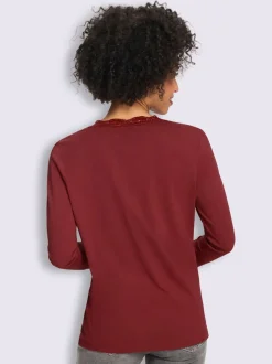T-shirt à manches longues bordure en dentelle au col v.
