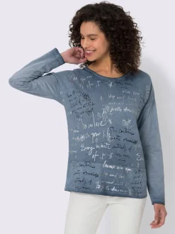 T-shirt à manches longues en coton avec imprimé feuille.