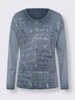 T-shirt à manches longues en coton avec imprimé feuille.